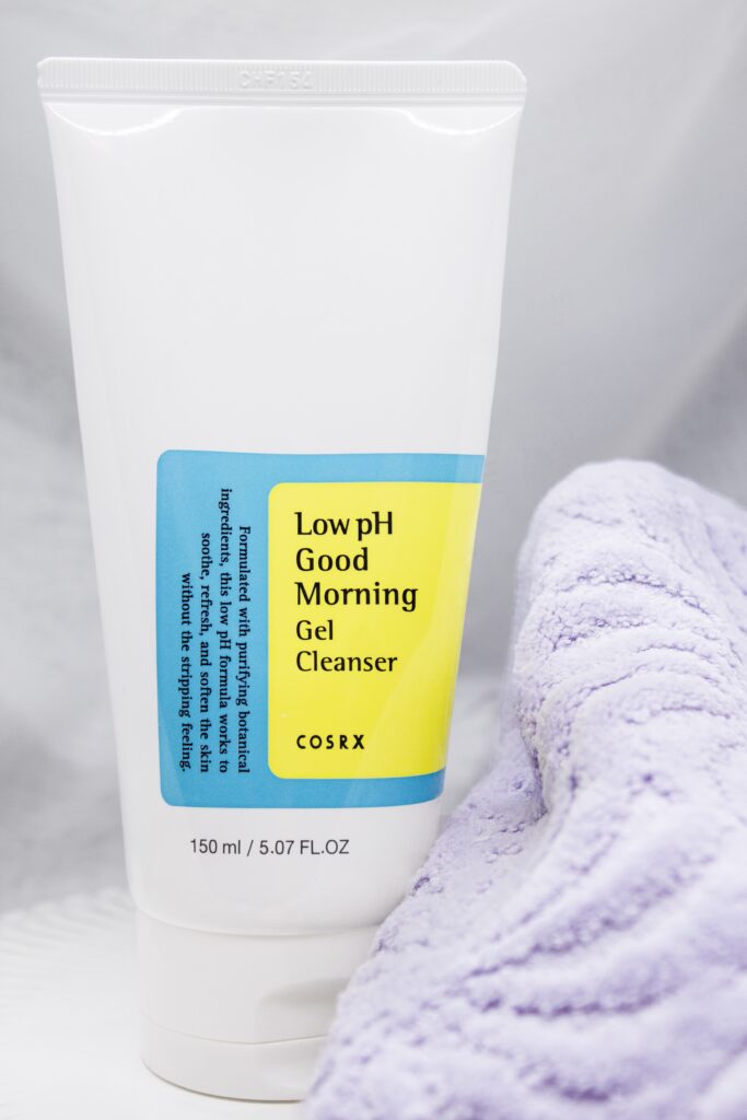 CosRX Low pH Good Morning Gel Cleanser in its beautifully designed packaging, promoting radiant skin.