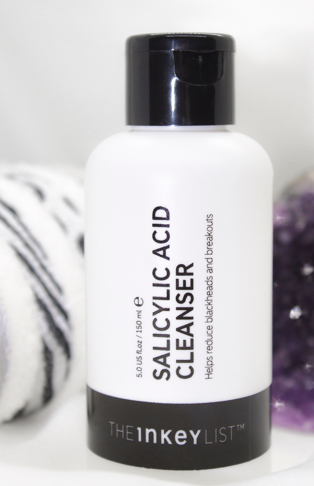 Close-up of The Inkey List Salicylic Acid Cleanser product packaging—Chemical Exfoliation.