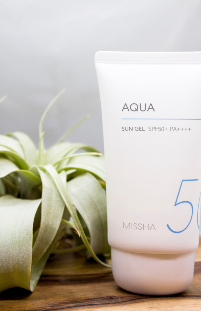 Missha Aqua Sun Gel SPF50+ PA++++ in its beautifully designed packaging, promoting radiant skin.