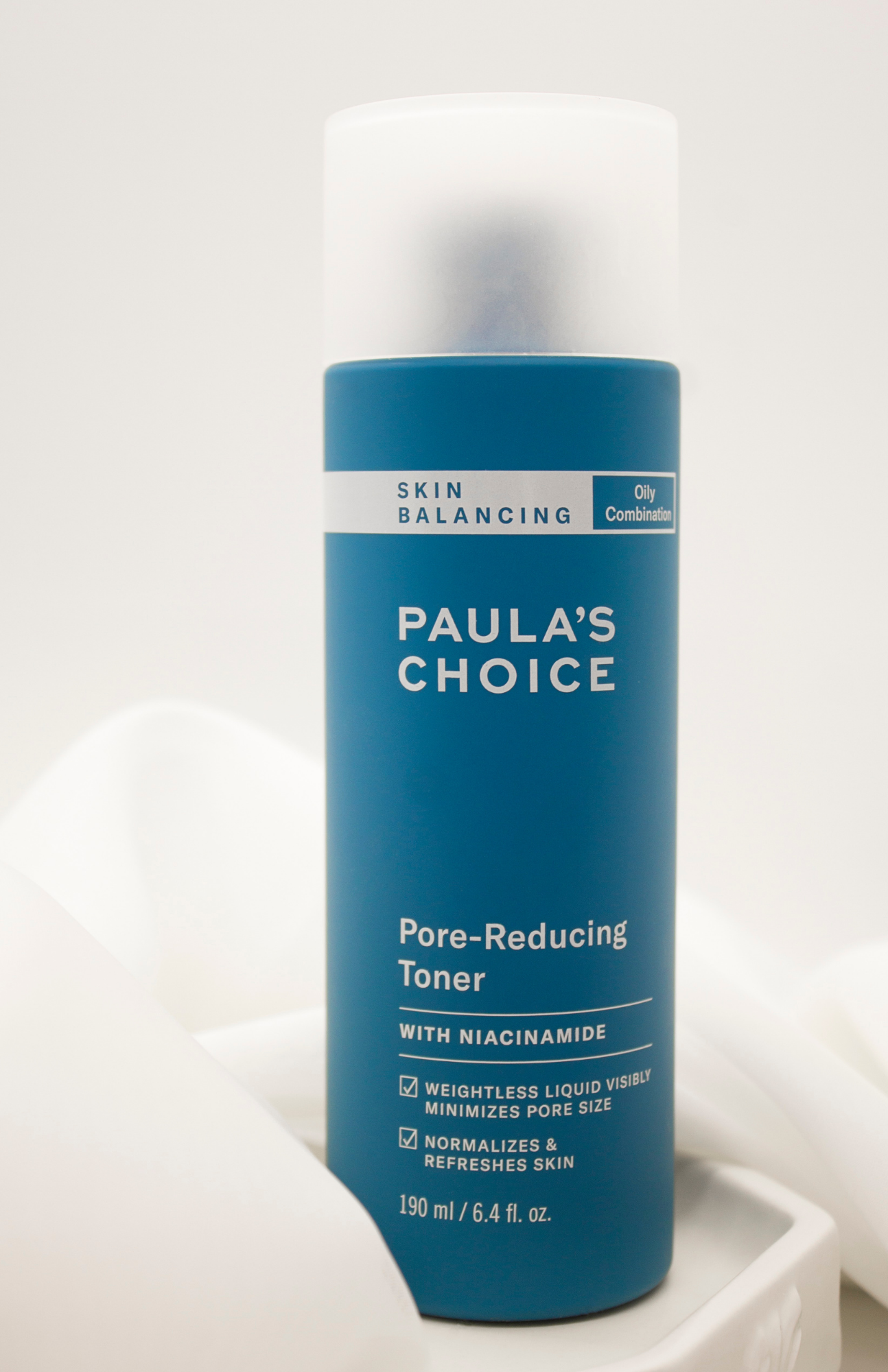 Paula's Choice Pore-Reducing Toner showcased in its elegant packaging.