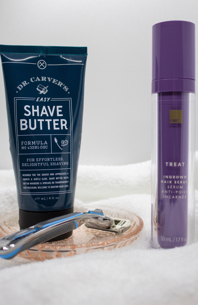 An image featuring a Dollar Shave Club razor, a container of shave butter, and a bottle of Ingrown Hair Serum, showcasing a comprehensive grooming and skincare product collection for shaving and aftercare, for a body care routine!