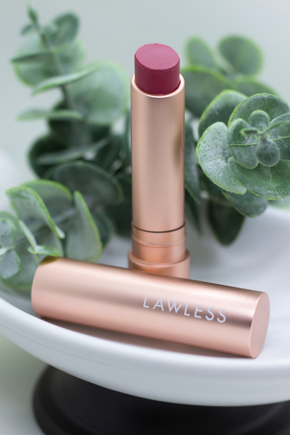 Lawless Forget the Filler Lip-Plumping Tinted Lip Balm Stick in Posey Shade - Product Image with Cap.