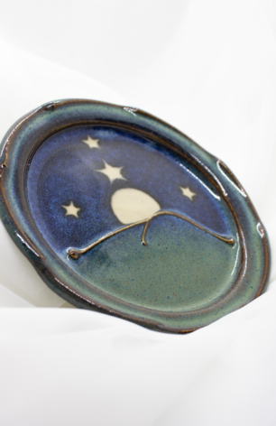 Handcrafted pottery collection from Appalachian Spring, highlighting unique bowls, trays, and vases in a variety of sizes, shapes, colors, and textures.