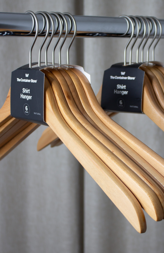 Sturdy wooden hangers for preserving the shape of jackets and coats.