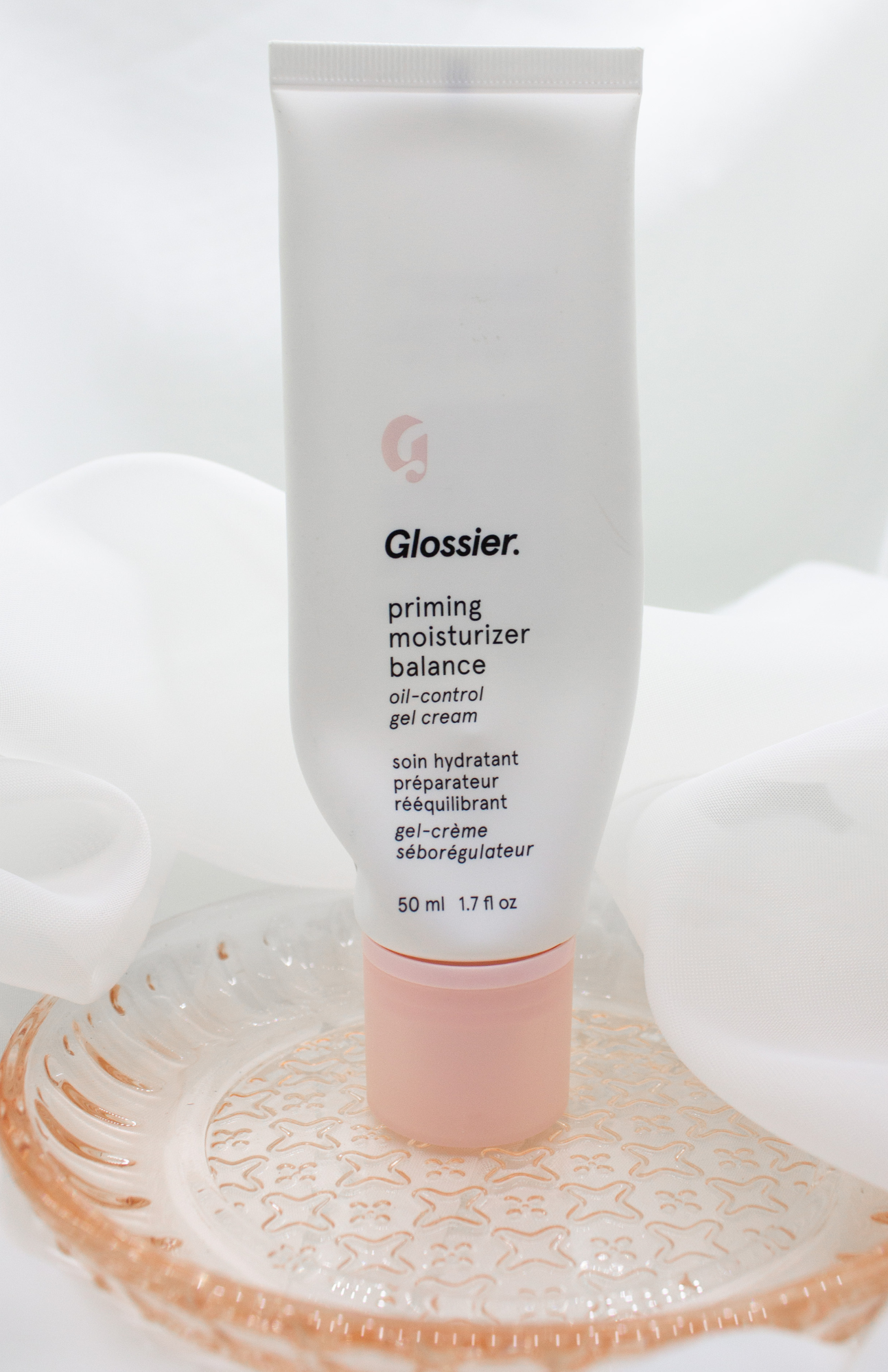 Glossier Priming Moisturizer Balance Oil-Control Gel-Cream displayed on a bright white background, ideal moisturizer for oily and combination skin.